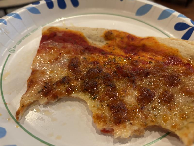 Motor Town Pizza ny style pizza slice eaten